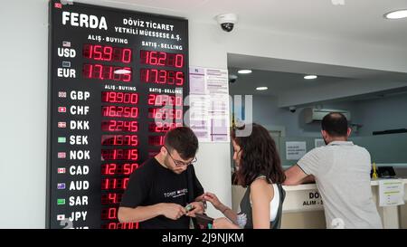 Turkish Lira continues to depreciate; Euro exceeded 17 TL, Dollar exceeded 16 TL. Turkish Lira which had been around 15 for a long time, has seen 16 today. The Turkish lira weakened further to 16.1 per USD in May. People are in an exchange office changing their money in Izmir, Turkey on May 24, 2022. Stock Photo