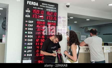Izmir, Turkey. 24th May, 2022. Turkish Lira continues to depreciate; Euro exceeded 17 TL, Dollar exceeded 16 TL. Turkish Lira which had been around 15 for a long time, has seen 16 today. The Turkish lira weakened further to 16.1 per USD in May. People are in an exchange office changing their money in Izmir. (Photo by Idil Toffolo/Pacific Press) Credit: Pacific Press Media Production Corp./Alamy Live News Stock Photo