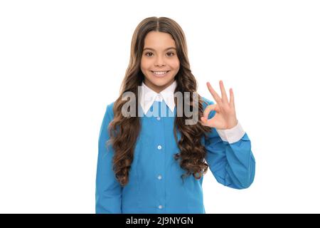 cheerful kid with curly hair. beauty and fashion. female fashion model. Stock Photo