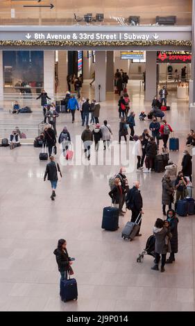 Moynihan Train Hall, an expansion of Penn Station in the former James A. Farley Post Office Building, has access to the Long Island Railroad & Amtrak. Stock Photo