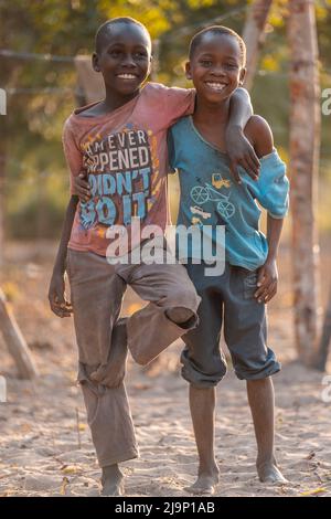 Mali,Kenya - Agust 19 2021:A poor village in Africa, happy children playing games with their friends. Stock Photo