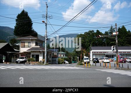 Intersection at Sengokuhara, a country town near Hakone-Yumoto with a Lawson convenience store (conbini) — Hakone; Kanagawa, Japan Stock Photo