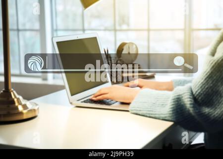 Woman using modern laptop at table. Concept of search Stock Photo