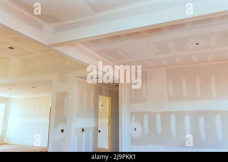 Finishing putty in the room walls on apartment renovation house remodeling new house empty apartment room Stock Photo