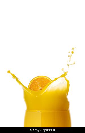 orange juice splash isolated on white. glass of splashing orange juice. close up. stock photo Stock Photo