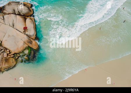 Coastline with beach, rocks and ocean in Brazil. Aerial view of tropical beach Stock Photo