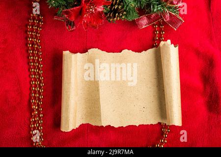 Christmas vintage scroll on red background. Stock Photo