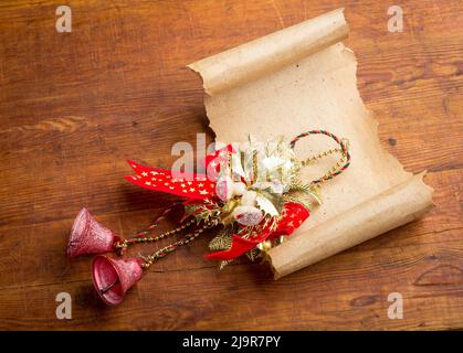 Christmas background old paper scroll on wood Stock Photo