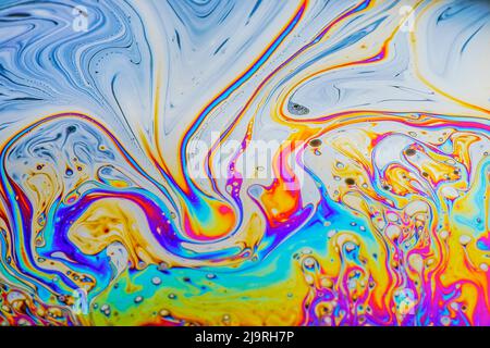 Abstract pattern of refracted light in soap bubble. Stock Photo
