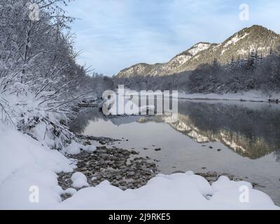 River Isar near Sylvenstein Reservoir close to village in the Karwendel mountain range during winter. Germany, Upper Bavaria Stock Photo