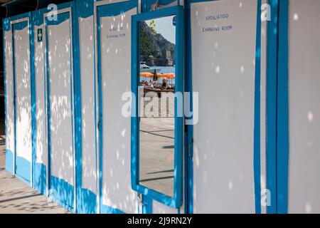 Italy, Positano. Changing rooms with reflection on the beach of Positano. Stock Photo