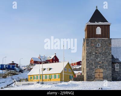 The church. Town Uummannaq during winter in northern West Greenland beyond the Arctic Circle. Greenland, Danish territory Stock Photo