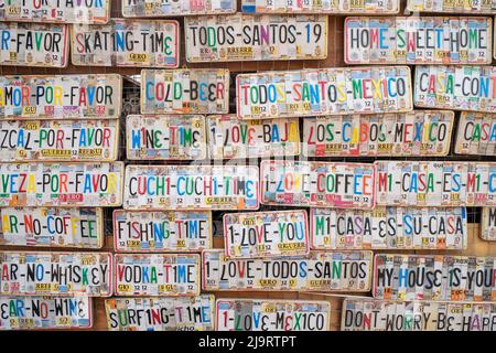 Todos Santos, Mexico. Souvenir signs made of cut-up license plates Stock  Photo - Alamy