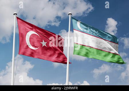 Republic of Uzbekistan and Saudi Arabia flags waving together in the ...