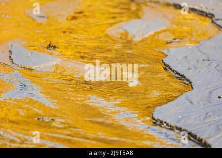 Bandon, Oregon, USA. Sunset light reflecting on water on the Oregon coast. Stock Photo
