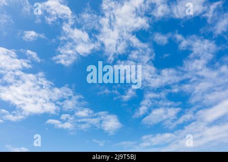 Bandon, Oregon, USA. Small clouds in a blue sky on the Oregon coast. Stock Photo