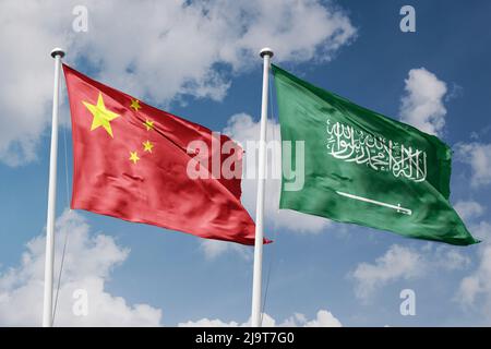 China and Saudi Arabia two flags on flagpoles and blue cloudy sky background Stock Photo