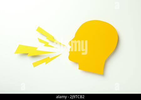 Paper head and lightnings on white background Stock Photo