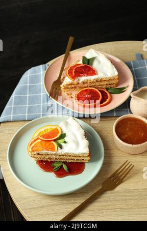 Composition of delicious dessert with meringue pie with citrus on wooden table Stock Photo