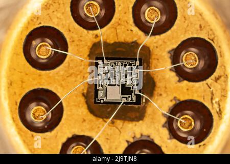 Housing with integrated circuit, light micrograph Stock Photo