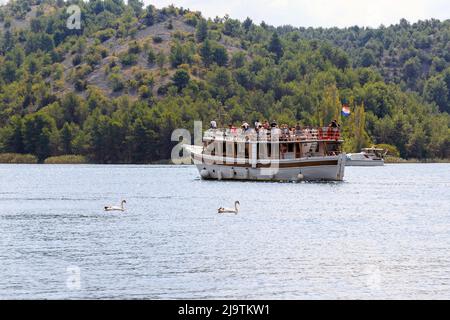 SKRADIN, CROATIA - SEPTEMBER 9, 2016: This is a pleasure boat on the Krka River in the National Nature Reserve. Stock Photo