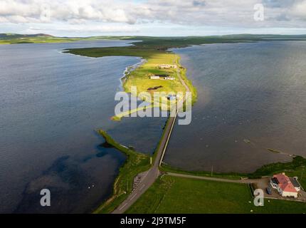 Aerial view of the Ness of Brodgar archaeological site located between  Loch Stenness (left) and Loch Harray, West Mainland, Orkney Islands, Scotland. Stock Photo