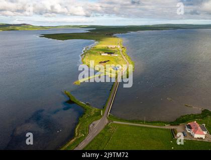 Aerial view of the Ness of Brodgar archaeological site located between  Loch Stenness (left) and Loch Harray, West Mainland, Orkney Islands, Scotland. Stock Photo