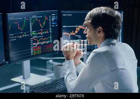 business man analyzing cryptocurrency market data. cryptocurrency, Stock Photo
