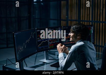 happy businessman looking at the computer screen. Stock Photo