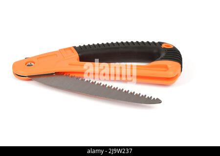 Folding garden saw in the folded state isolated on a white background, pocket saw. High resolution photo. Full depth of field. Stock Photo