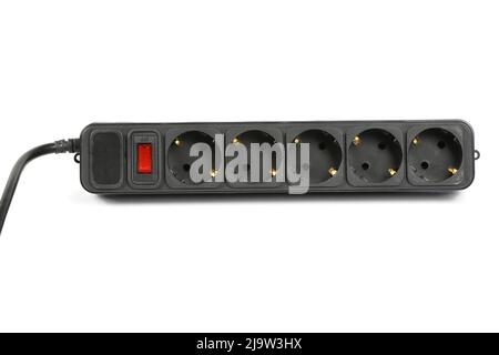 Black plastic electrical extension cord for household appliances isolated on white. High resolution photo. Full depth of field. Stock Photo