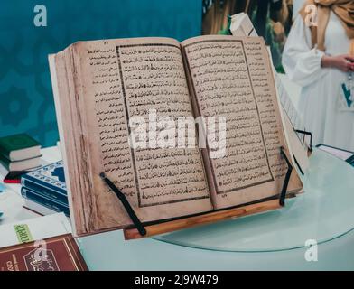 Kazan, Russia. May 19, 2022. Open pages of the Koran, the holy book for Muslims. Calligraphic writing Stock Photo