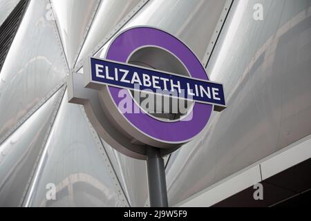 London, UK. 25th May, 2022. A sign advertising the Elizabeth line named after Her Majesty the Queen Elizabeth 11 at Canary Wharf Station on Wednesday, May 25, 2022. The Elizabeth line opened yesterday stretching more than 100 km from Reading to Heathrow in the West and Abbey Wood in the East.It is expected to serve over 200 million people a year. Photo by Hugo Philpott/UPI Credit: UPI/Alamy Live News Stock Photo