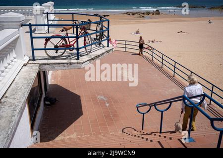 Shadows on terrace steps from a mid-day sun casts zigzag shadows at Playa del Camello in Santander, on 19th May 2022, in Santander, Cantabria, Spain. Stock Photo