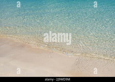 Turquoise colored ocean and sandy beach in Semporna, Sabah Borneo, Malaysia Stock Photo