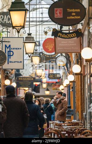 PARIS, FRANCE - April 2022: Passage des Panoramas is the oldest covered passages of Paris. Stock Photo