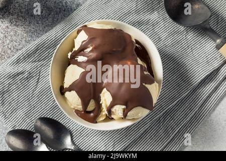 Sweet Hard Chocolate Shell Ice Cream Sundae in a Bowl Stock Photo