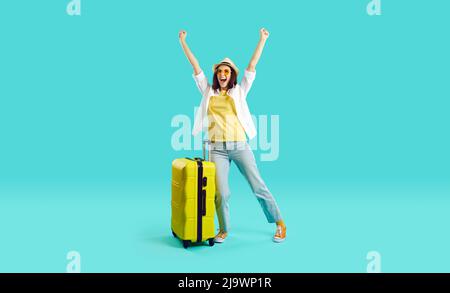 Crazy happy tourist woman enjoys open borders and now she can fly on long-awaited summer vacation. Stock Photo