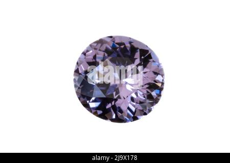 Faceted Lilac-colored Spinel gemstone from Sri Lanka. Silight Oval/near round, 7x7.6mm. Weight 1.64 carats. Photographed with white background. Stock Photo
