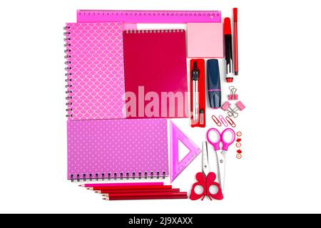 A set of stationery in different shades of pink and red, on a light background. I'm going to school soon. Stock Photo