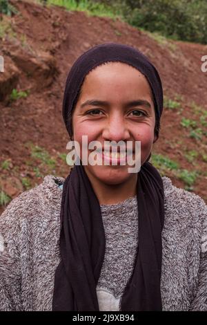 teenage berber girl with headscarf, Ait Blal, azilal province, Atlas mountain range, morocco, africa Stock Photo