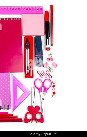 A set of stationery in different shades of pink and red, on a light background. I'm going to school soon. Stock Photo