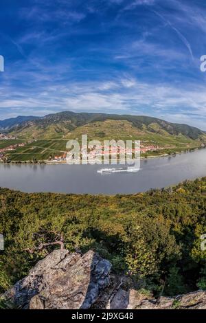 Panorama of Wachau valley (Unesco world heritage site) with ship on Danube river against Duernstein village in Lower Austria, Austria Stock Photo