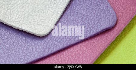 Leather samples close-up, abstract background, texture. Shopping and industry Stock Photo