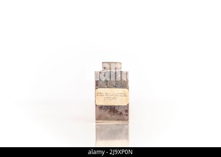 Medication flask from antique war medicine chest. isolated on white background. Stock Photo