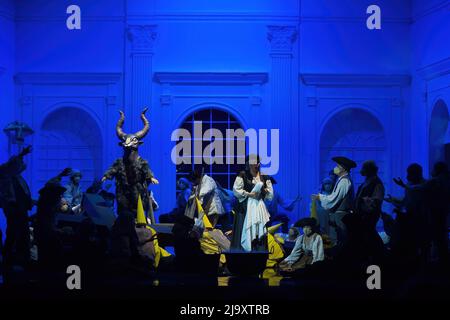 Actors perform with a huge cross during a general rehearsal of the opera at Cervantes theatre. II Trovatore, an opera by Giusepppe Verdi, is directed by Spanish opera director Carlos Aragon and it sets in Spanish Independence War. The opera closes the 33° lyrical season at Cervantes theatre. Stock Photo