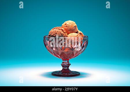 Chocolate ice cream in pink glass bowl Stock Photo