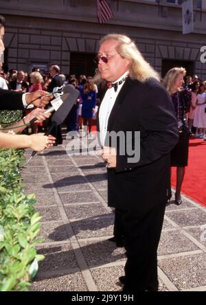 Sam Kinison at the 43rd Annual Primetime Emmy Awards on August 25, 1991 at the Pasadena Civic Auditorium in Pasadena, California.  Credit: Ralph Dominguez/MediaPunch Stock Photo