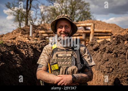 Soldiers and civilians pose for a photo before Maj. Gen. Stuart W ...