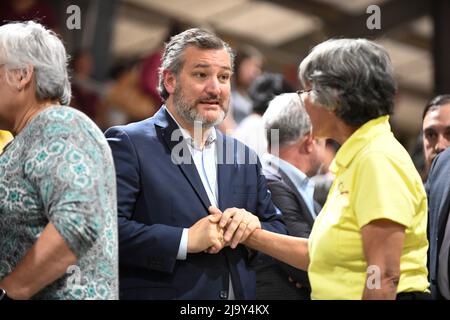 Uvalde, United States. 25th May, 2022. U.S. Sen TED CRUZ greets a Uvalde resident at a community-wide healing service held at the Uvalde County fairgrounds. The event follows a mass shooting at Uvalde's Robb Elementary School where a gunman killed 19 students and two teachers on Tuesday. Credit: Bob Daemmrich/17�Թ����� Live News Stock Photo